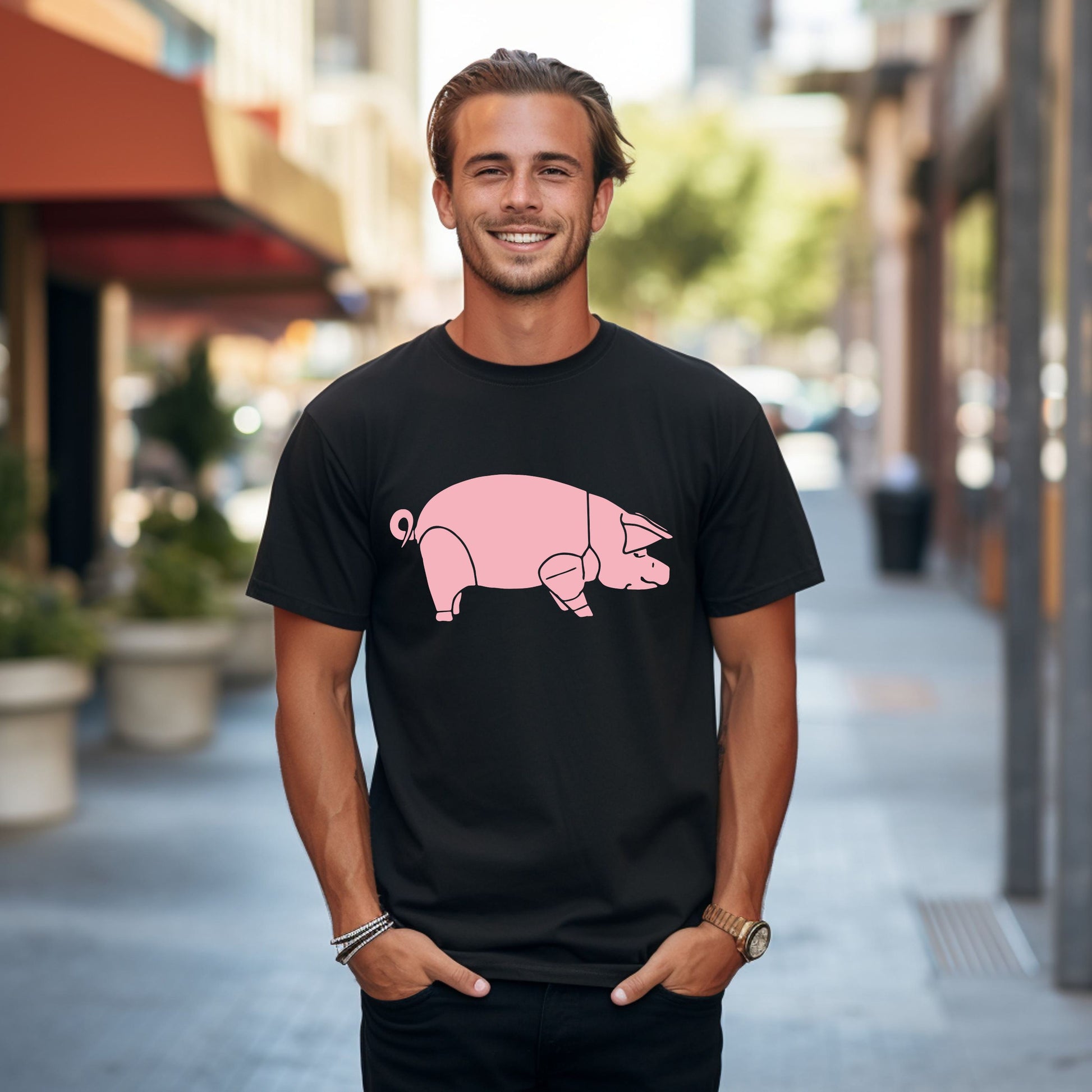 Graphic pink pig on a black T-shirt.